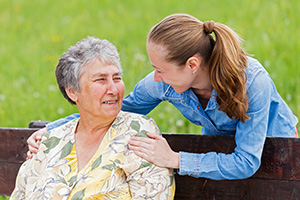 Woman visiting with her mother